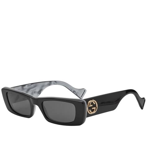 gucci tessabit|Sunglasses by Gucci .